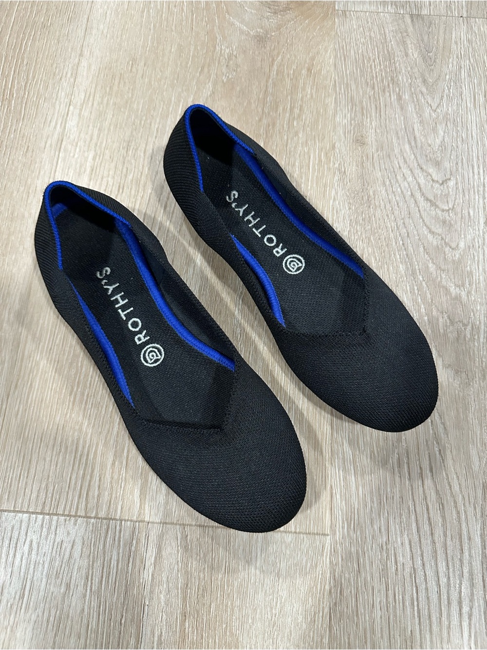 Rothy’s The Flat Round Toe Ballet Flats in Black with Blue Trim, Size 9